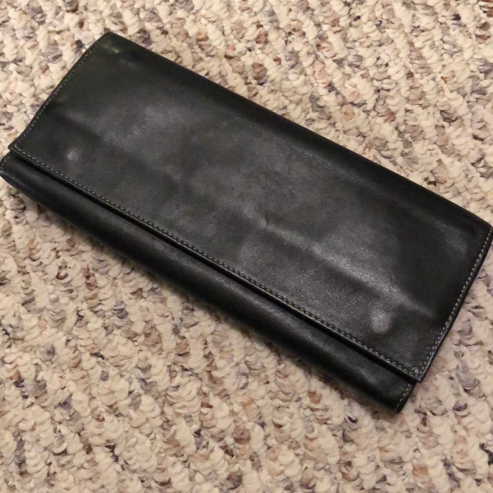 Black Tri-fold All leather jewelry travel purse.